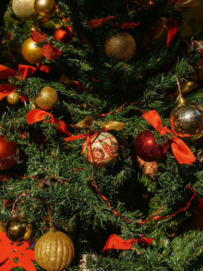 Christmas tree with red and gold ornaments